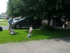 Alicia helping to cut the grass